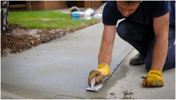 Ensure Proper Drainage and Manage Landscaping